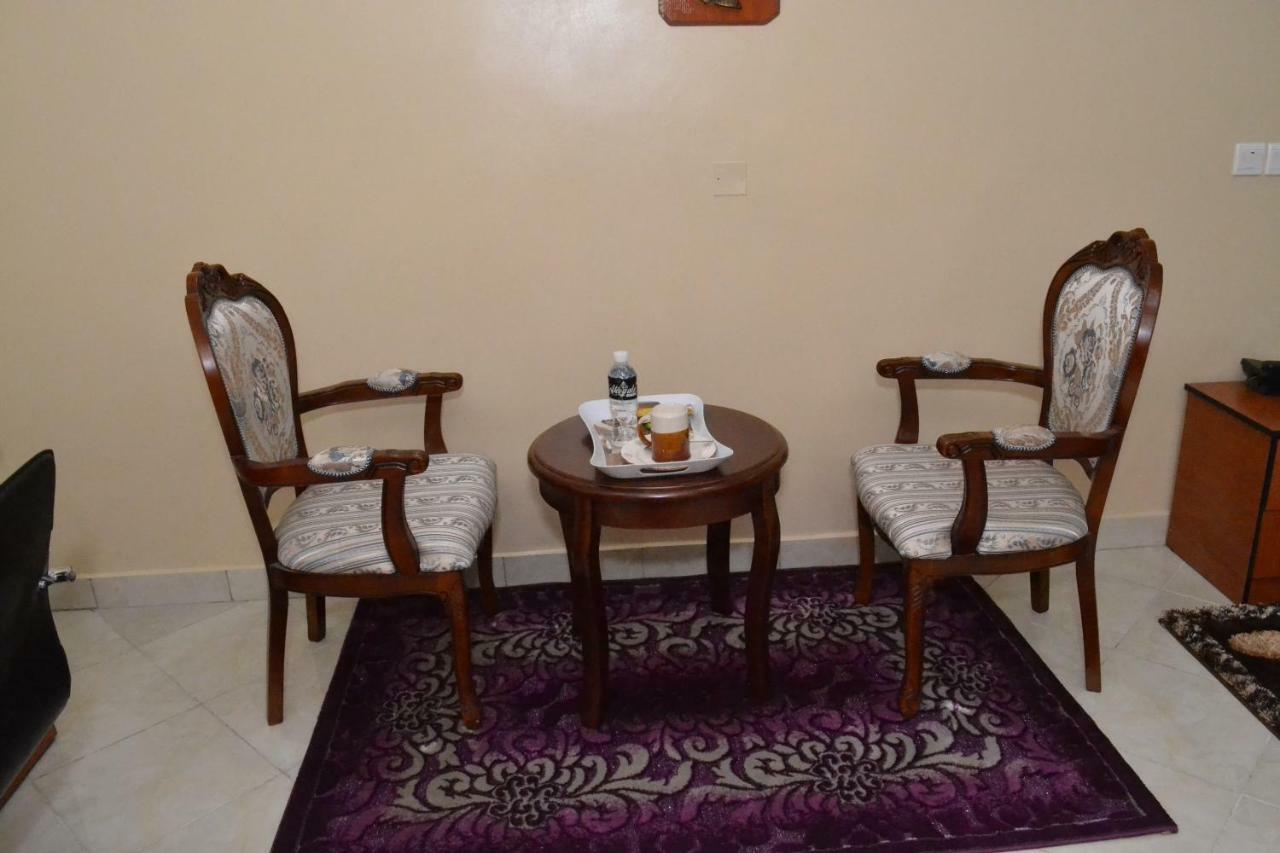Limoh Suites Бенин-Сити Экстерьер фото