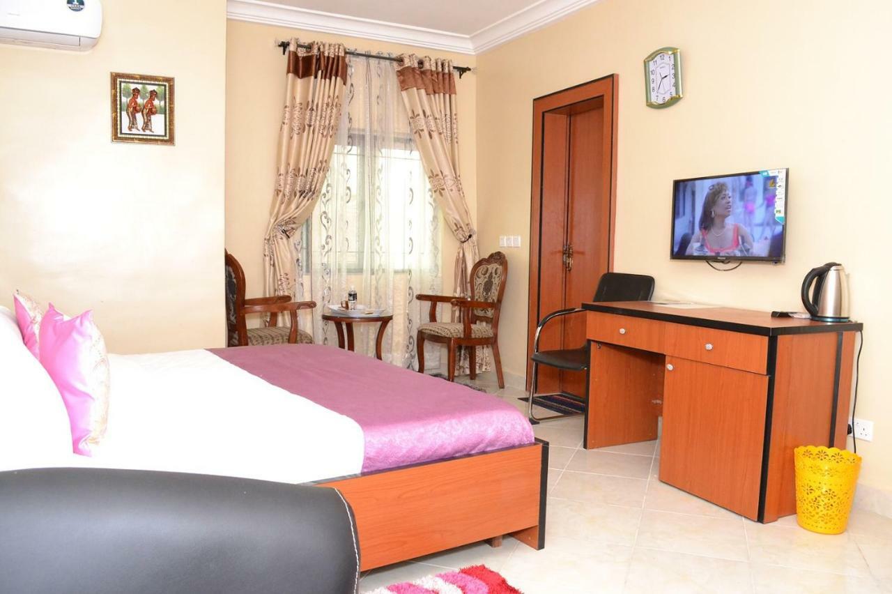 Limoh Suites Бенин-Сити Экстерьер фото